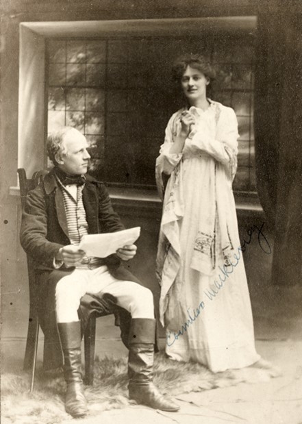 Seán Connolly (seated) and Countess Markievicz on stage at the Abbey Theatre during a performance of her husband’s play ‘The Memory of the Dead’