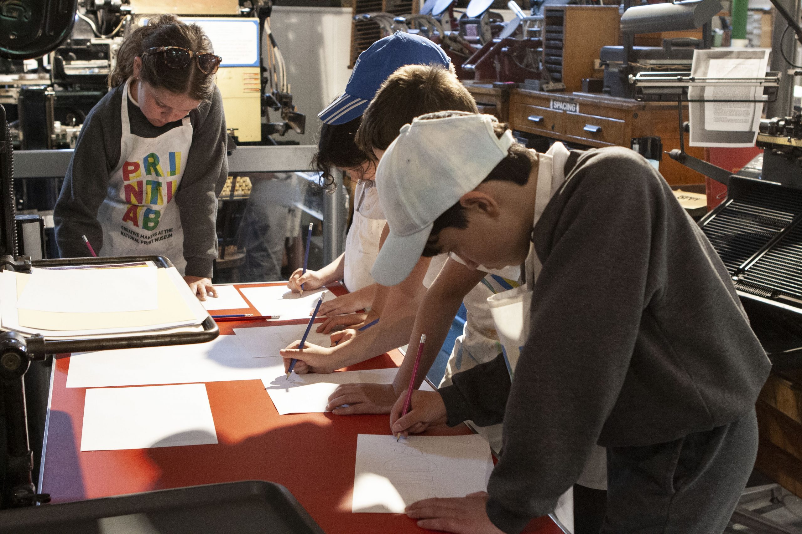 Students composing their election posters.