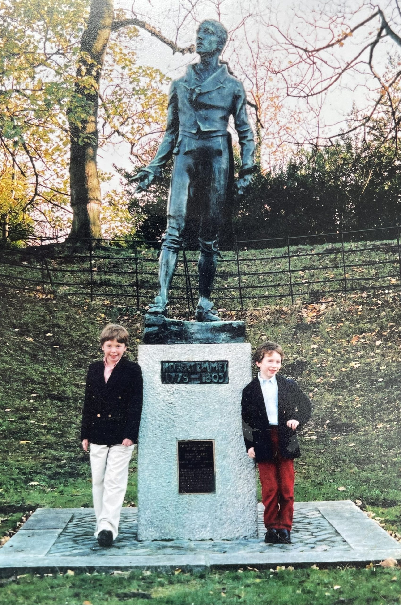 Thomas and Ferdy Emmet standing at the Robert Emmet Statue, 2003. Courtesy of the Emmet Family.